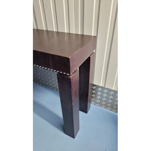 206 - AN EXQUISITE SIMPSON’S OF LONDON ‘NEPTUNE’ LEATHER CLAD CONSOLE TABLE, with chrome bead trim to the ... 