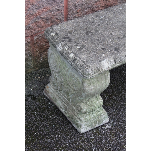 209 - A HEAVY STONE GARDEN BENCH, comprised of three seperate free standing pieces (seat, and two supporti... 