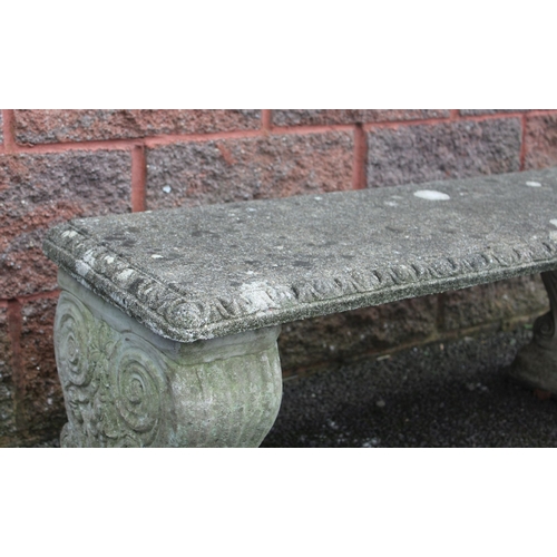 209 - A HEAVY STONE GARDEN BENCH, comprised of three seperate free standing pieces (seat, and two supporti... 