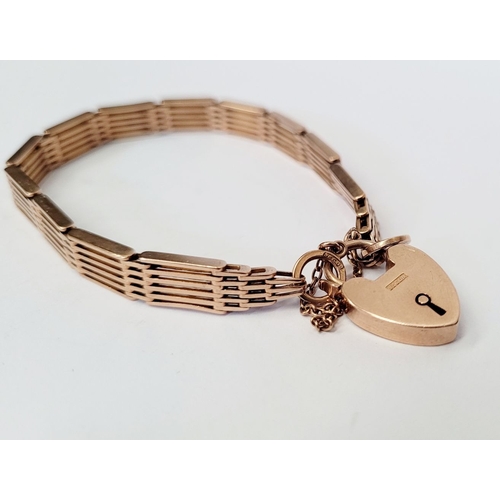 21 - A 9CT GOLD ‘GATE’ LINK BRACELET WITH HEART SHAPED LOCK, a lovely design, weighs: 16.7grams. Includes... 