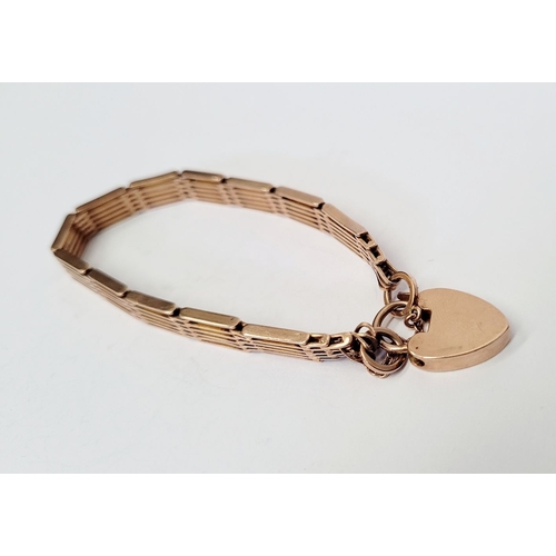 21 - A 9CT GOLD ‘GATE’ LINK BRACELET WITH HEART SHAPED LOCK, a lovely design, weighs: 16.7grams. Includes... 