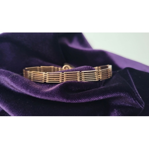 21 - A 9CT GOLD ‘GATE’ LINK BRACELET WITH HEART SHAPED LOCK, a lovely design, weighs: 16.7grams. Includes... 