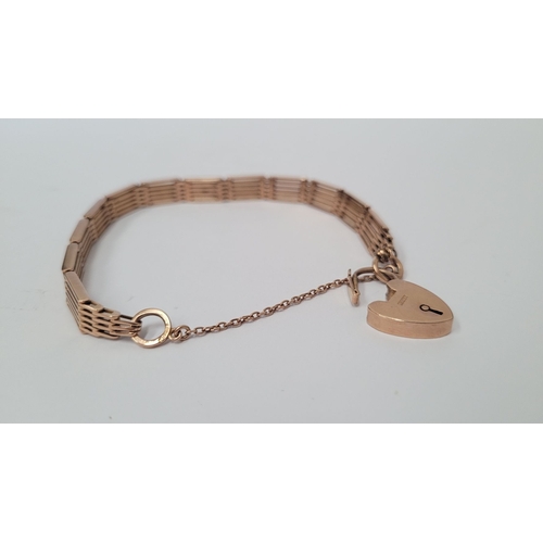 21 - A 9CT GOLD ‘GATE’ LINK BRACELET WITH HEART SHAPED LOCK, a lovely design, weighs: 16.7grams. Includes... 