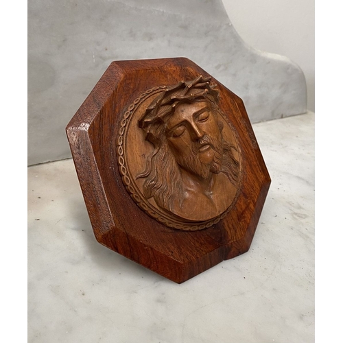 216 - A VINTAGE CARVED FRUITWOOD RELIGIOUS RELIEF ALONG WITH A HARDWOOD MOTHER OF PEARL CRUCIFIX, with car... 