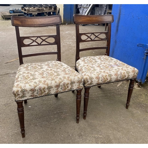 219 - A PAIR OF 19TH CENTURY MAHOGANY DINING CHAIRS, each with reeded border to top rail above carved spla... 