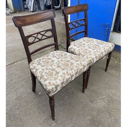 219 - A PAIR OF 19TH CENTURY MAHOGANY DINING CHAIRS, each with reeded border to top rail above carved spla... 