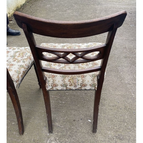 219 - A PAIR OF 19TH CENTURY MAHOGANY DINING CHAIRS, each with reeded border to top rail above carved spla... 