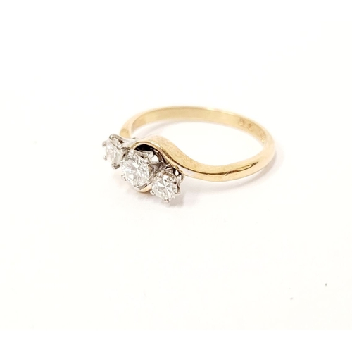 22 - A LOVELY 18CT YELLOW GOLD & PLATINUM THREE STONE DIAMOND TWIST RING, lovely bright diamonds in a twi... 