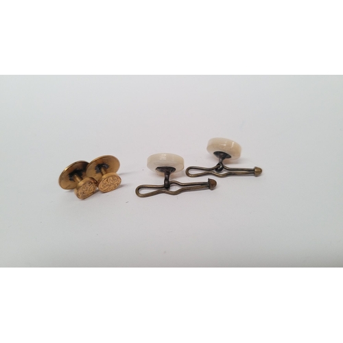 229 - A CASED SET OF CUFF LINKS, 2 x mother of pearl style button shaped, and 2 x gold coloured button sha... 