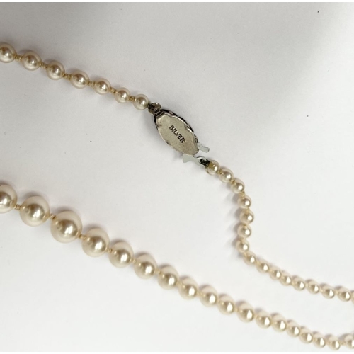 230 - A ‘LOTUS DE LUXE’ GRADUATED SIMULATED PEARL NECKLACE WITH SILVER CLASP, simulated pearl necklace in ... 