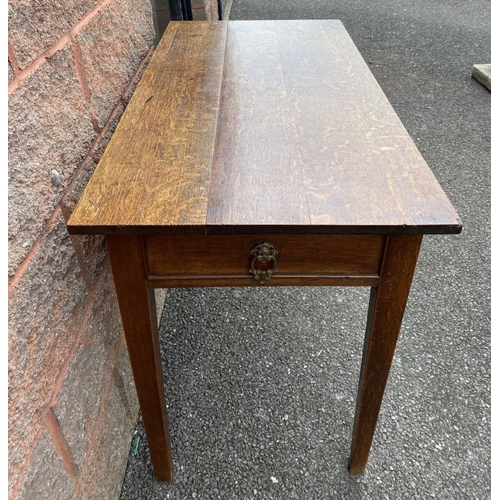 237 - AN ANTIQUE OAK SIDE TABLE, a single drawer to one side with ornate brass handles; faux drawer to opp... 