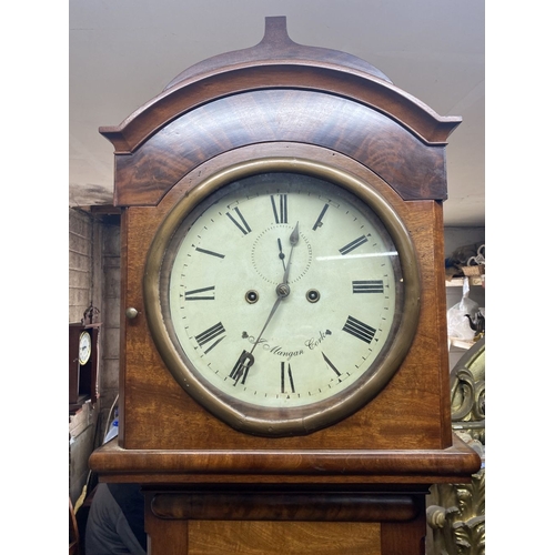 24 - AN EXCELLENT IRISH ‘J. MANGAN CORK’ MAHOGANY LONGCASE GRANDFATHER CLOCK, in flame mahogany case. The... 