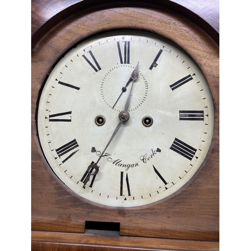 24 - AN EXCELLENT IRISH ‘J. MANGAN CORK’ MAHOGANY LONGCASE GRANDFATHER CLOCK, in flame mahogany case. The... 