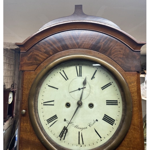 24 - AN EXCELLENT IRISH ‘J. MANGAN CORK’ MAHOGANY LONGCASE GRANDFATHER CLOCK, in flame mahogany case. The... 