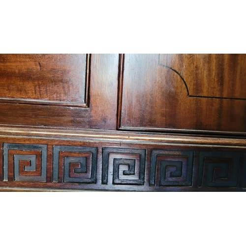 243 - AN EARLY 20TH CENTURY MAHOGANY BUFFET / SIDEBOARD, possibly O’Connell’s of Cork, with a raised back ... 