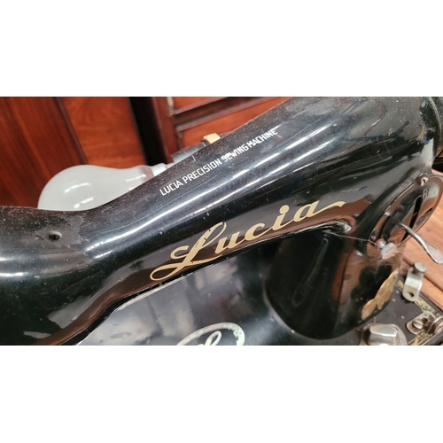 247 - AN VINTAGE IRISH LUCIA PRECISION SEWING MACHINE – MOTOR BY HILLMAN ELECTRIC MOTORS LTD, sitting on a... 