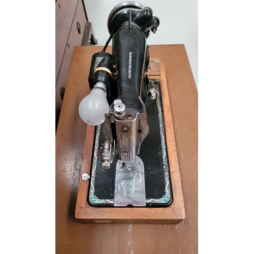 247 - AN VINTAGE IRISH LUCIA PRECISION SEWING MACHINE – MOTOR BY HILLMAN ELECTRIC MOTORS LTD, sitting on a... 