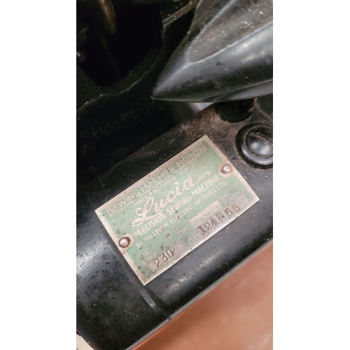 247 - AN VINTAGE IRISH LUCIA PRECISION SEWING MACHINE – MOTOR BY HILLMAN ELECTRIC MOTORS LTD, sitting on a... 