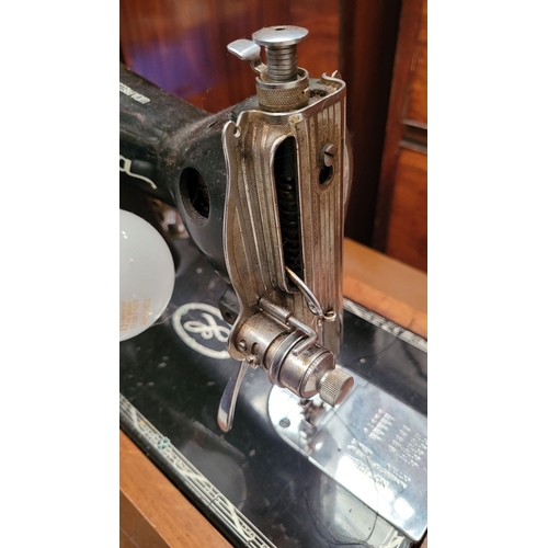 247 - AN VINTAGE IRISH LUCIA PRECISION SEWING MACHINE – MOTOR BY HILLMAN ELECTRIC MOTORS LTD, sitting on a... 