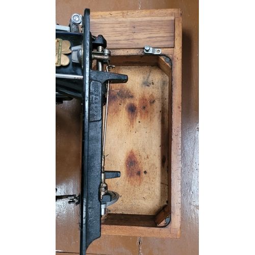 247 - AN VINTAGE IRISH LUCIA PRECISION SEWING MACHINE – MOTOR BY HILLMAN ELECTRIC MOTORS LTD, sitting on a... 