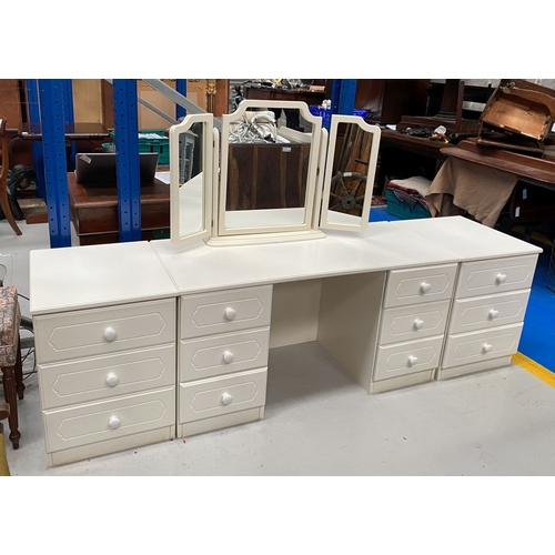 260 - A SIX DRAWER VANITY/DRESSING TABLE ALONG WITH PAIR OF BEDSIDE LOCKERS, with three panelled mirror to... 