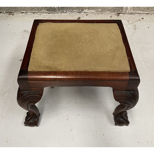 271 - A FINE MAHOGANY UPHOLSTERED FOOTSTOOL, with carving to knee, standing on claw and ball foot. Dimensi... 