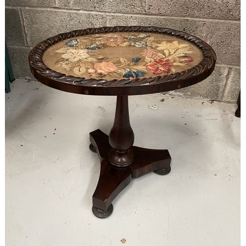 273 - AN ANTIQUE MAHGOANY NEEDLEPOINT OCCASSIONAL/LAMP TABLE, with oval floral neelepoint within glass to ... 