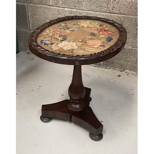 273 - AN ANTIQUE MAHGOANY NEEDLEPOINT OCCASSIONAL/LAMP TABLE, with oval floral neelepoint within glass to ... 