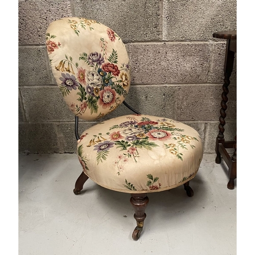 277 - A FINE FLORAL UPHOLSTERED NURSING CHAIR, with floral upholstered back rest and seat, resting on turn... 