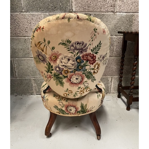 277 - A FINE FLORAL UPHOLSTERED NURSING CHAIR, with floral upholstered back rest and seat, resting on turn... 