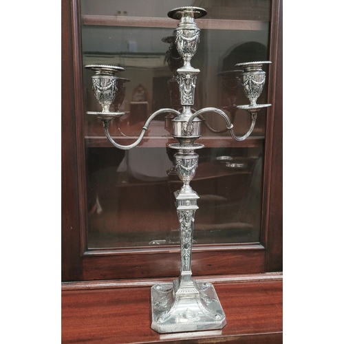 28 - AN IMPRESSIVE PAIR OF EDWARDIAN SILVER CANDLEABRA, both with detachable three heads, two held up wit... 