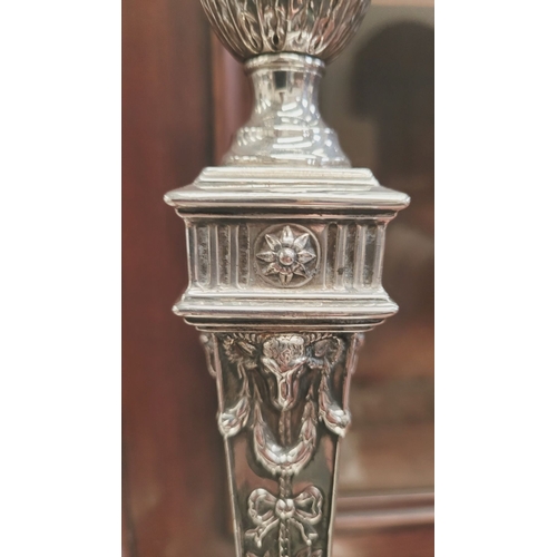 28 - AN IMPRESSIVE PAIR OF EDWARDIAN SILVER CANDLEABRA, both with detachable three heads, two held up wit... 