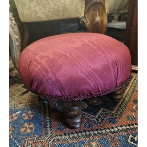 283 - A LOVELY SMALL UPHOSTERED FOOT REST, with stained oak legs, nice burgundy watermarked silk style fab... 