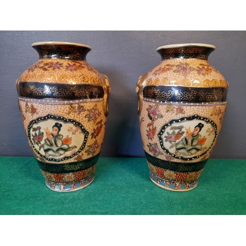 287 - A PAIR OF VINTAGE SATSUMA VASES, each with picture panels depicting a lady seated surrounded by flow... 