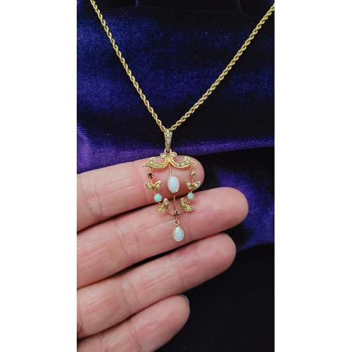 29 - A BEAUTIFUL & DELICATE 9CT YELLOW GOLD OPAL, GARNET & SEED PEARL PENDANT ON A ROPE CHAIN, the pendan... 