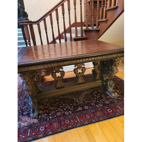 295 - AN EXCELLENT RENAISSANCE REVIVAL CARVED LIBRARY TABLE, with crossbanding to top, the edges with moul... 