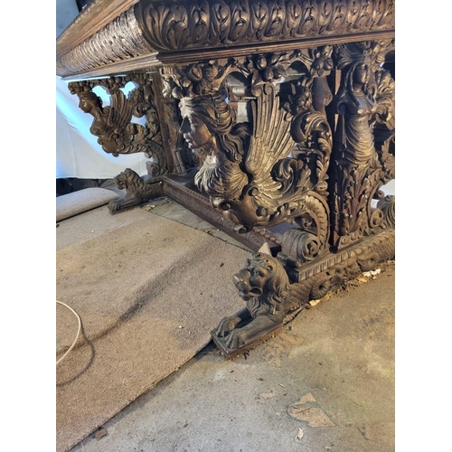 295 - AN EXCELLENT RENAISSANCE REVIVAL CARVED LIBRARY TABLE, with crossbanding to top, the edges with moul... 