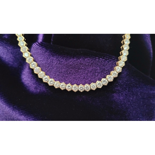 3 - A STUNNING FINELY CRAFTED 18CT YELLOW GOLD DIAMOND NECKLACE, with a total carat weight of 12cts. Eac... 