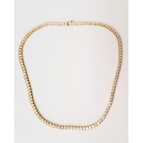 3 - A STUNNING FINELY CRAFTED 18CT YELLOW GOLD DIAMOND NECKLACE, with a total carat weight of 12cts. Eac... 