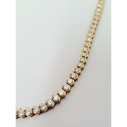 3 - A STUNNING FINELY CRAFTED 18CT YELLOW GOLD DIAMOND NECKLACE, with a total carat weight of 12cts. Eac... 