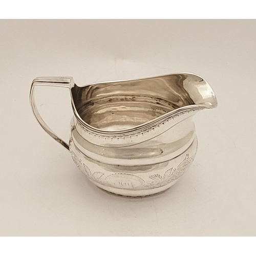 31 - A VERY FINE & RARE CORK IRISH SILVER CREAM JUG, circa 1800, impressed ‘STERLING’ mark to the base, a... 