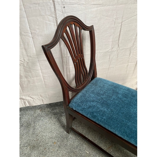 35 - A VERY GOOD MAHOGANY HEPPLEWHITE STYLE WINDOW SEAT, each side with carved shield supports, the seat ... 