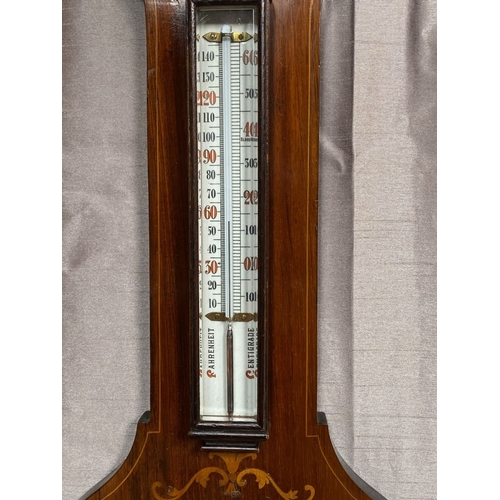 40 - A VERY GOOD ROSEWOOD INLAID BAROMETER THERMOMETER, the rosewood frame inlaid with bow and swag decor... 