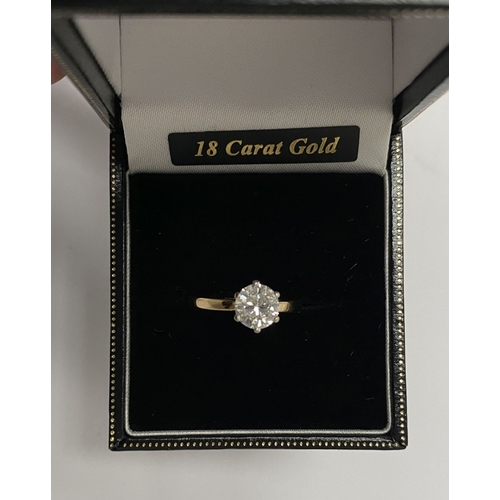 5 - A BEAUTIFUL 18CT YELLOW GOLD DIAMOND SOLITAIRE RING, with central round brilliant cut diamond set in... 