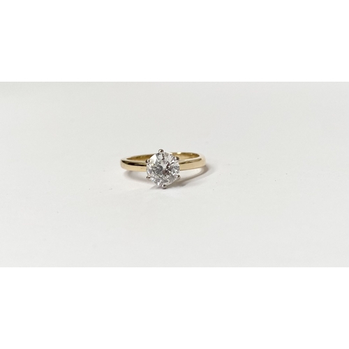 5 - A BEAUTIFUL 18CT YELLOW GOLD DIAMOND SOLITAIRE RING, with central round brilliant cut diamond set in... 