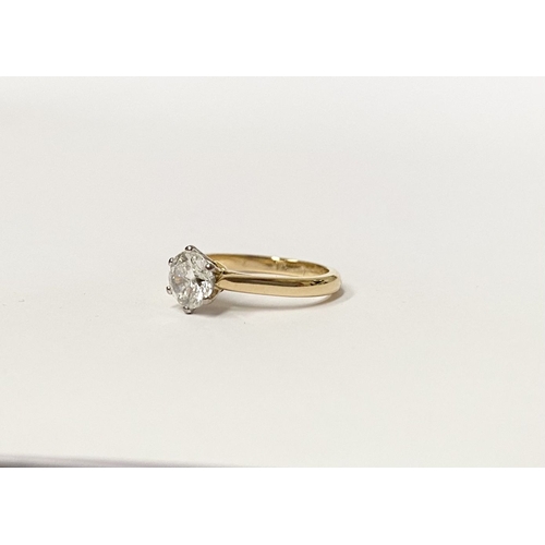 5 - A BEAUTIFUL 18CT YELLOW GOLD DIAMOND SOLITAIRE RING, with central round brilliant cut diamond set in... 