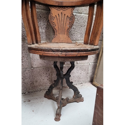 53 - AN ANTIQUE REVOLVING 'CAPTAIN'S' CHAIR, the seat has a beautiful carved splat back and curved crest ... 