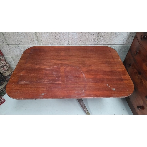 57 - A GOOD QUALITY REGENCY MAHOGANY TIP-UP TABLE, the rectangular table has a reeded edge and rests upon... 