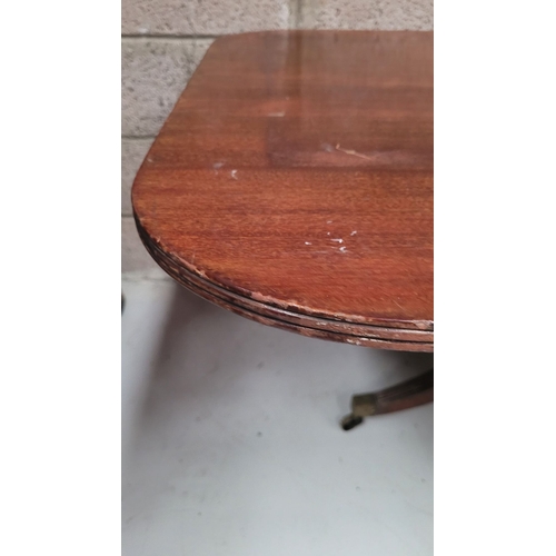 57 - A GOOD QUALITY REGENCY MAHOGANY TIP-UP TABLE, the rectangular table has a reeded edge and rests upon... 