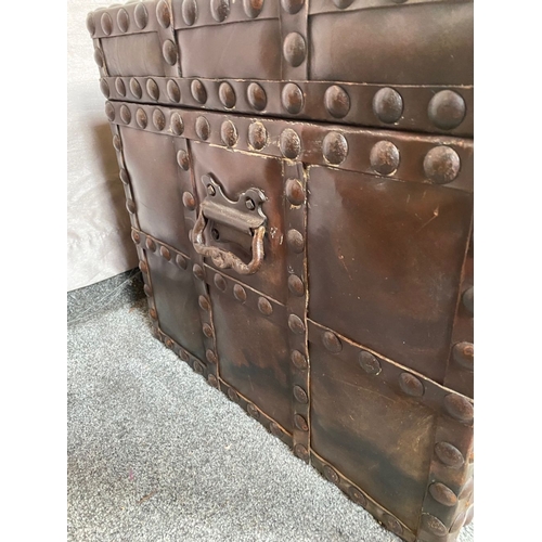 78 - A GOOD OAK LINED LEATHER TRUNK CHEST, the exterior with steel stud decoration and steel handles to s... 